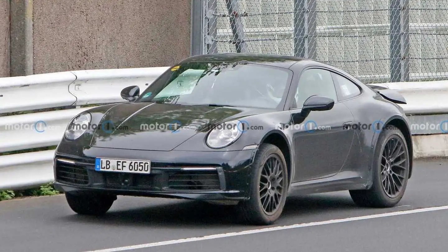 Porsche 911 Prototype Spied With Lifted Suspension, Chunky Arches