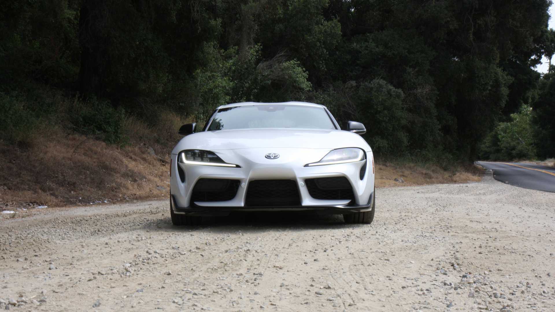 You can see a 2020 Toyota Supra tearing through the woods without any care