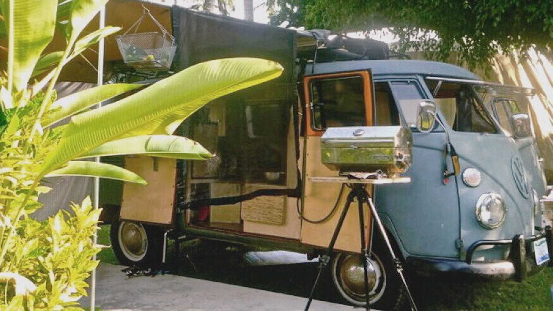 This tiny VW Camper van has a sectional sofa