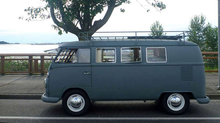 This tiny VW Camper van has a sectional sofa