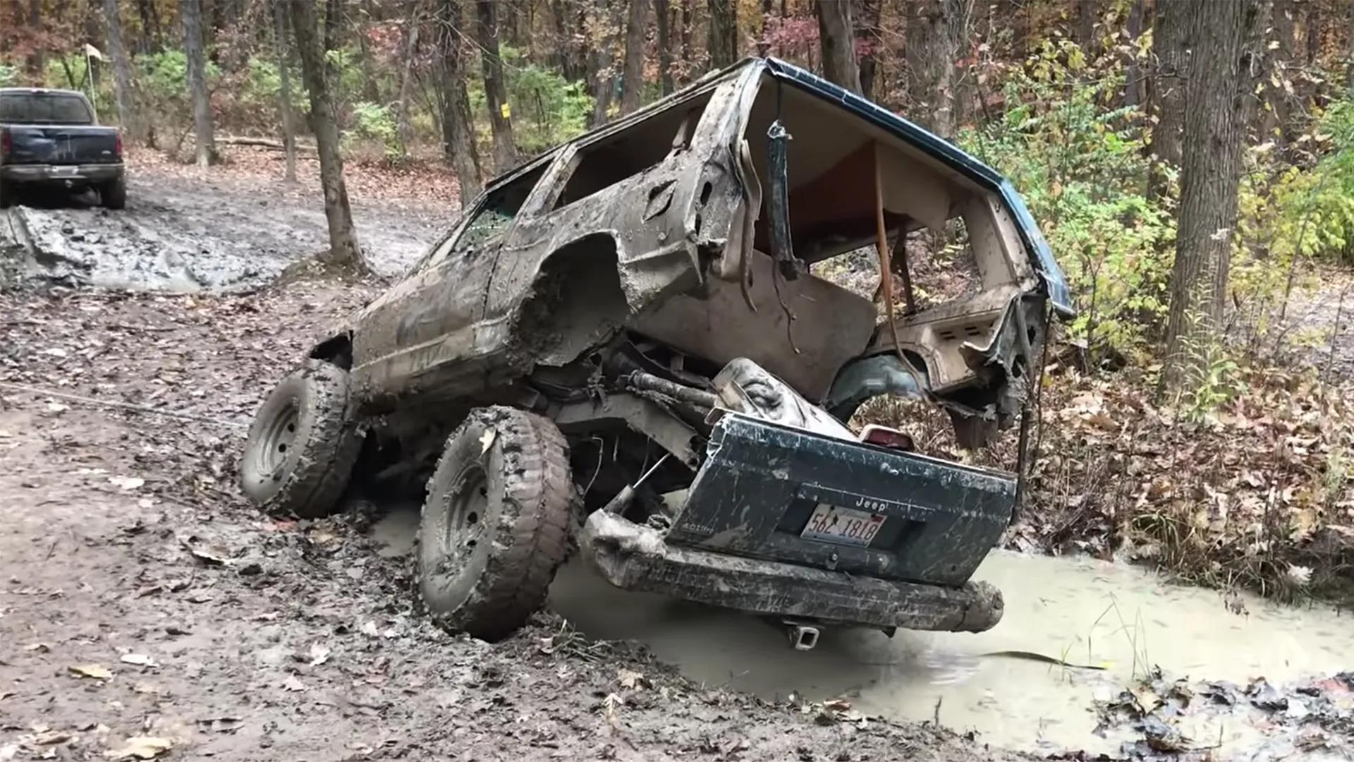 Off-roading goes horribly wrong when a rusted Jeep hits mud hole