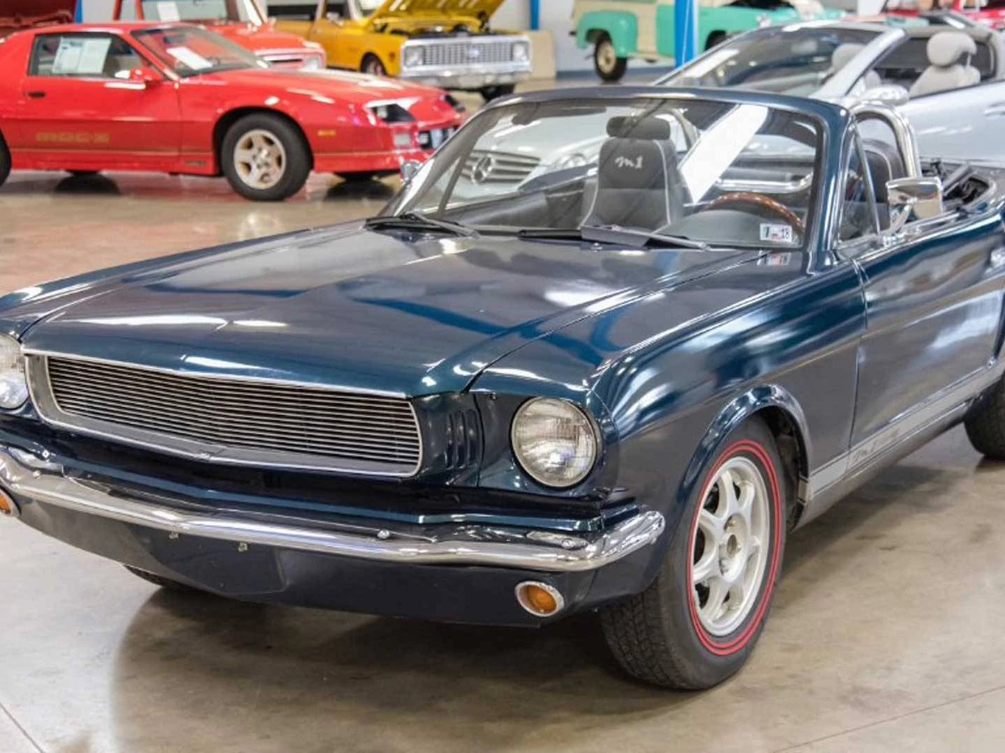 This Classic Mustang is actually a Mazda Miata and it's for sale