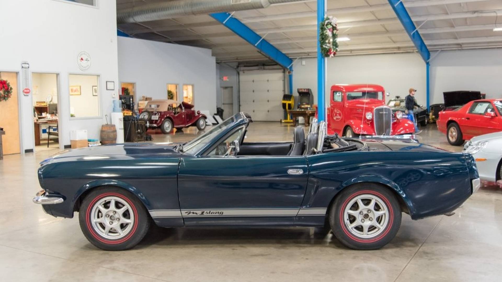 This Classic Mustang is actually a Mazda Miata and it's for sale