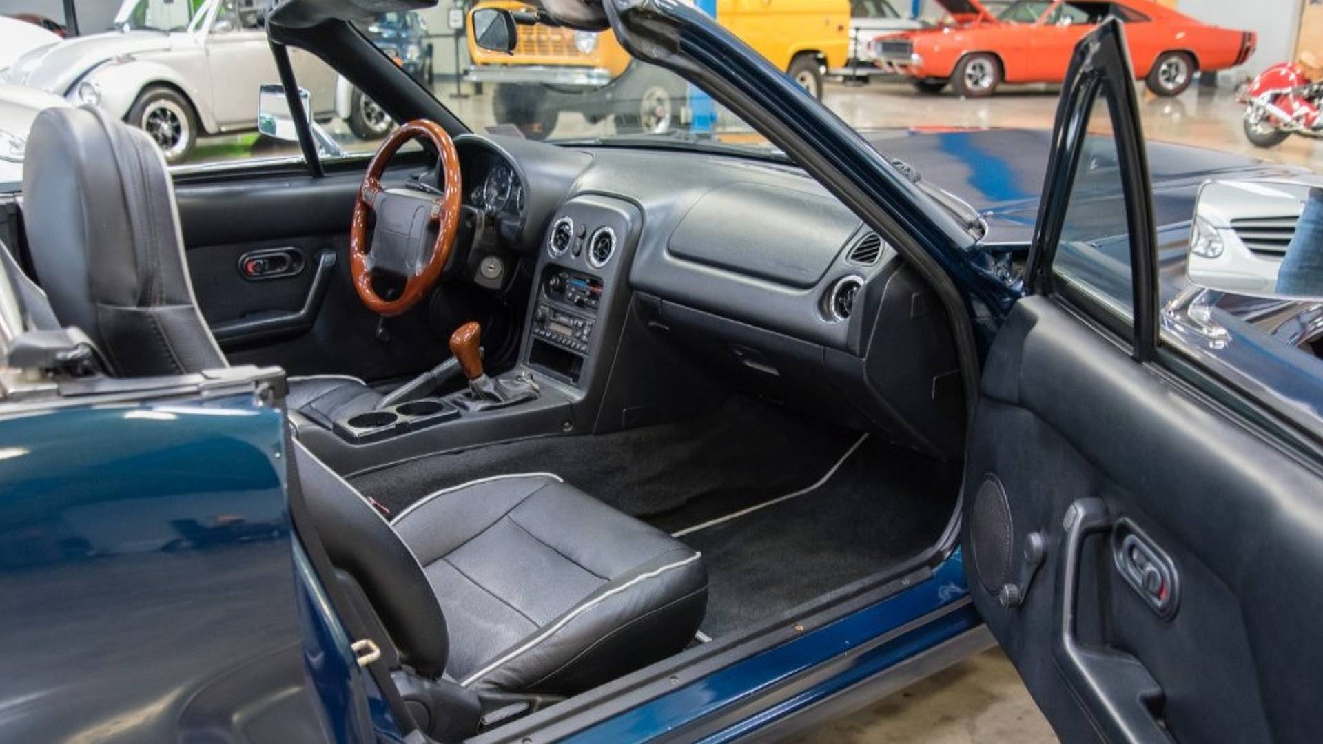 This Classic Mustang is actually a Mazda Miata and it's for sale