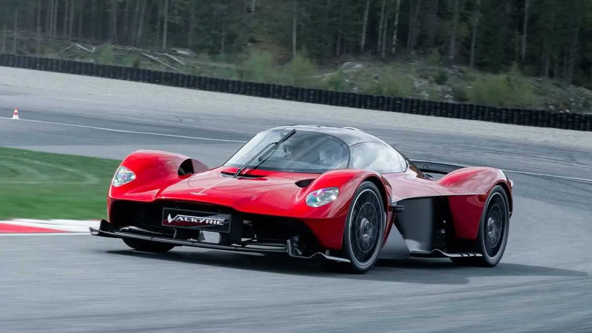 supernova red aston martin valkyrie break up a race track