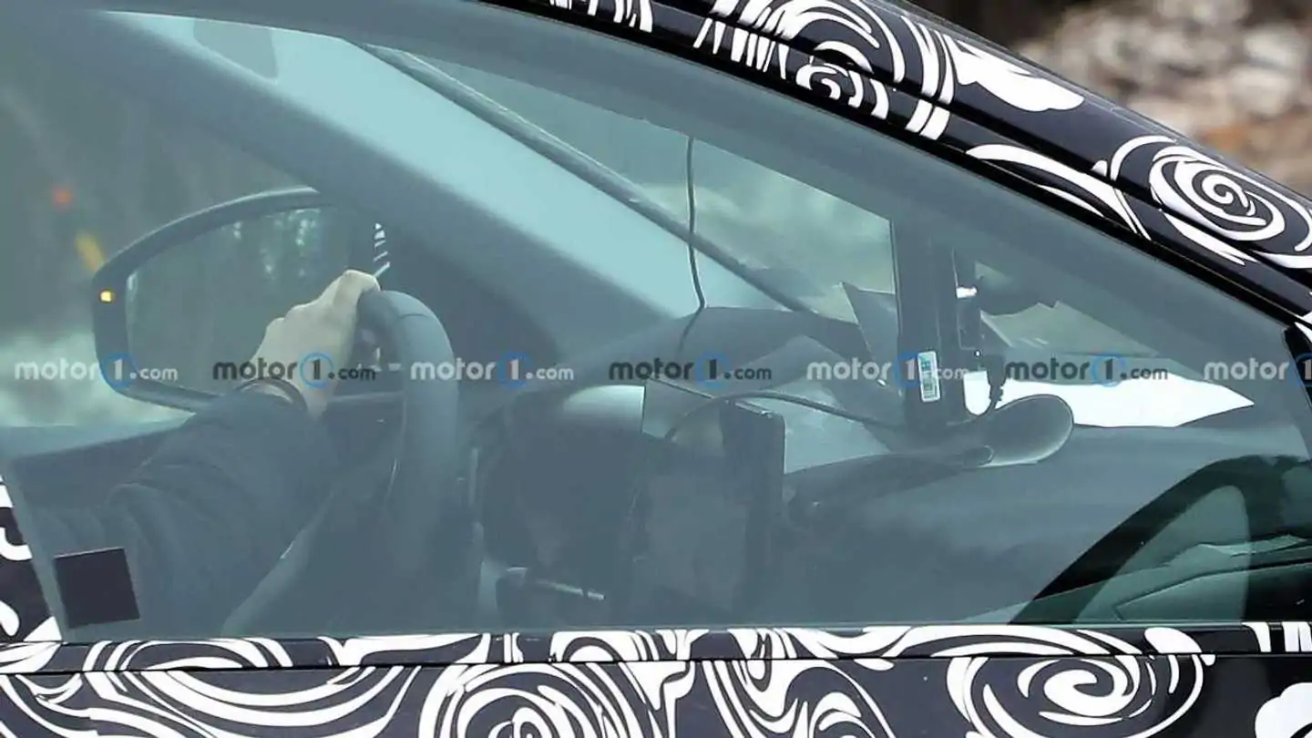 Spy Photos of the New Audi Q6 Etron provide a glimpse at the interior