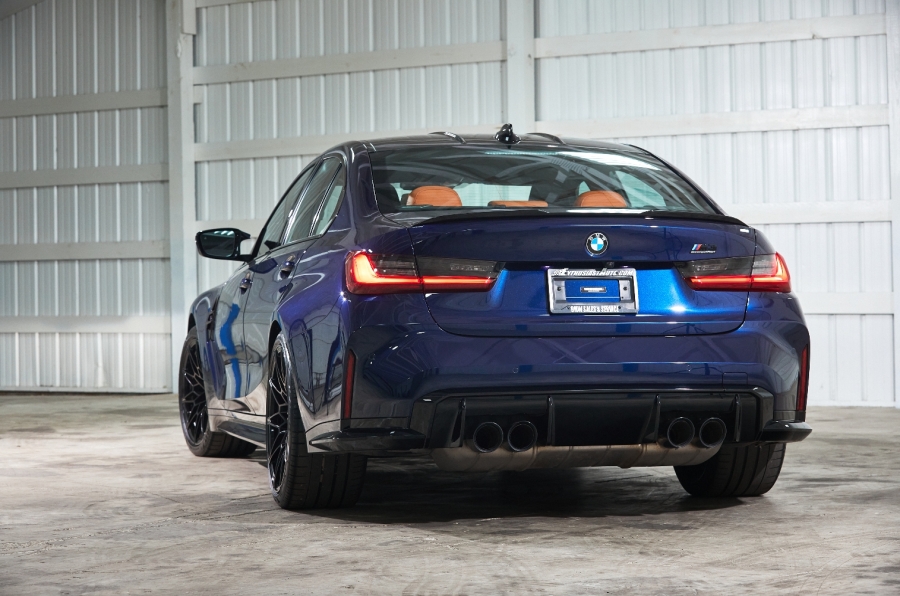 The BMW M3 Tanzanite Blue is heavy-specced and features a carbon fiber rear wing.