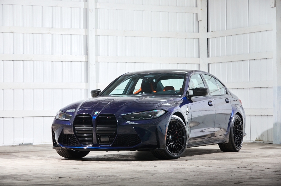 The BMW M3 Tanzanite Blue is heavy-specced and features a carbon fiber rear wing.